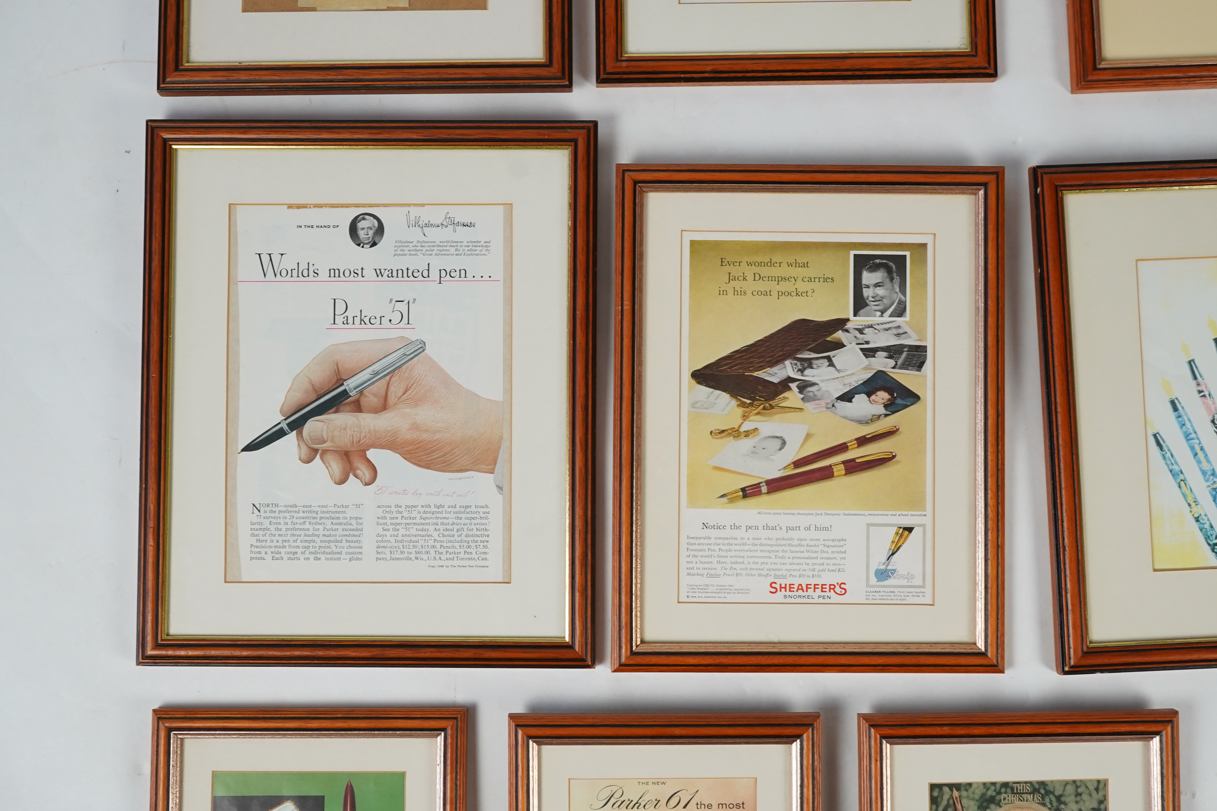 Framed fountain pen adverts (12)